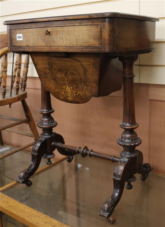 A Victorian marquetry inlaid figured walnut work table, W.51cm